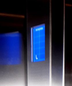 Electronic indicator in an elevator car displaying L for Lobby.